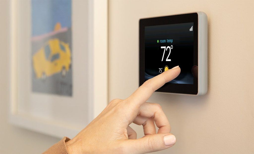 Woman Hand Smart Wall Thermostat